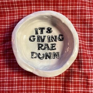 silly little trinket/jewelry holder 
white natural clay
“it’s giving Rae Dunn”